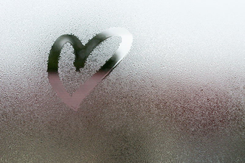 bathroom accessories Melbourne shower screen with water condensation and a heart drawn